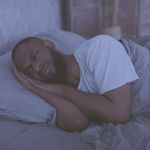 fotosearchmannotsleeping